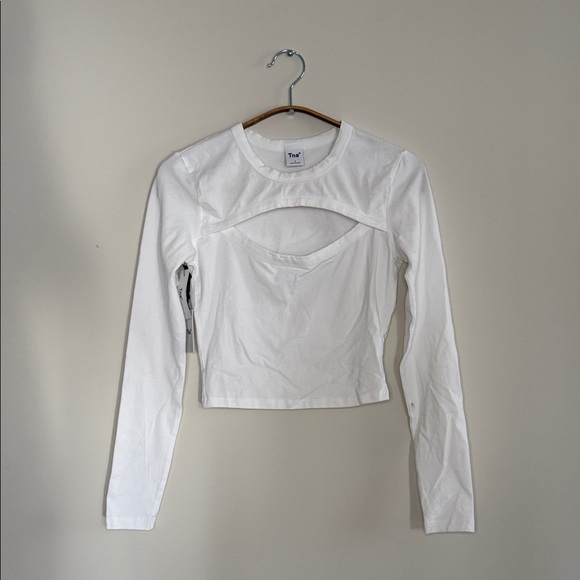 TNA Tops - BNWT TNA White Cut-Out Long Sleeve Crop Top